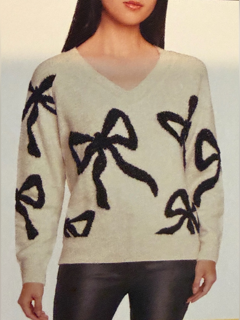 Express Cream V-Neck Sweater with Black Bow Accents